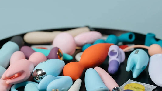 Assorted colorful adult toys including vibrators and intimate accessories on display