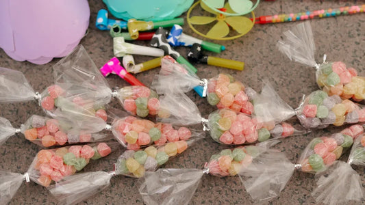 Colorful candy bags with party favors, perfect for adult celebrations and gifts