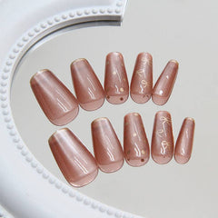 Nude Press-On Nails with Gold Marble Design Wearing - 24 Piece Set for a Sophisticated Look